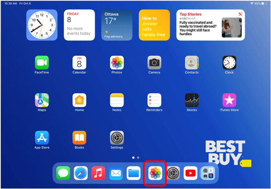 Écran d'accueil de l'iPad avec l'application Photos entourée en rouge pour montrer comment ouvrir l'application Photos
