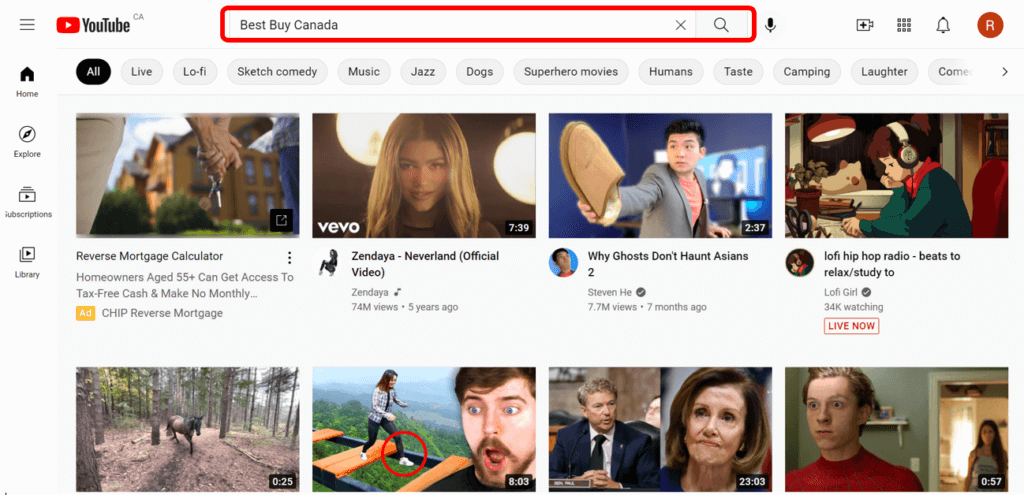 Youtube home screen with Best Buy typed into search bar to show how to search for a Youtube channel.