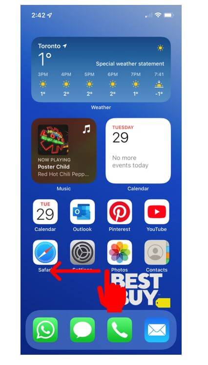 iPhone home screen with hand showing how to swipe to view App Library