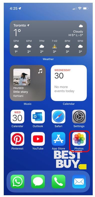 iPhone home screen with Photos app highlighted in red to show how to view photo library