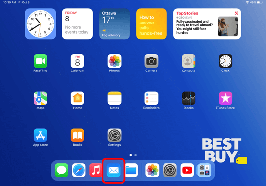 iPad home screen with Mail app highlighted