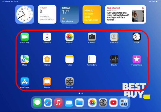 iPad home screen with blue background
