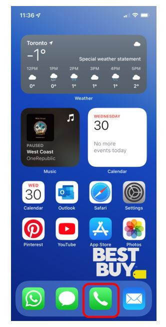iPhone home screen with Phone app highlighted