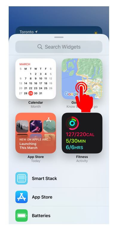 iPhone screen with hand showing how to add Google Maps as a widget