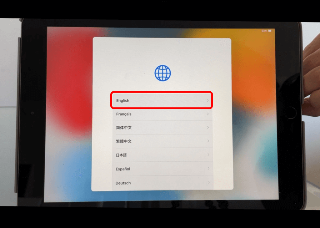 iPad screen with language option English circled in red