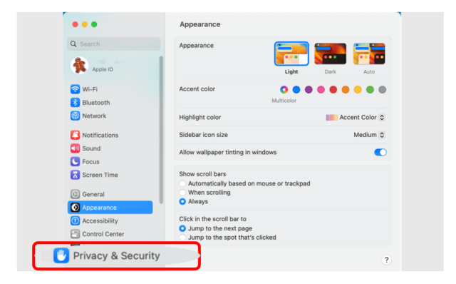 System preferences menu on Macbook with Privacy and Security highlighted
