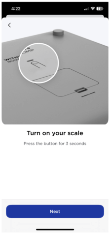 Back of Withings scale highlighting the power button to press and hold for 3 seconds to turn on scale.